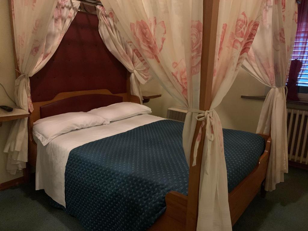 Posteľ alebo postele v izbe v ubytovaní Hotel Ficocle