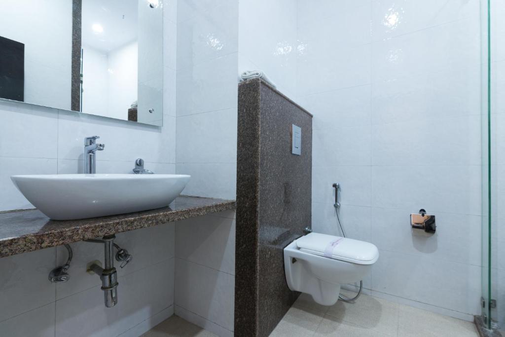 Koupelna v ubytování Rupam Hotel