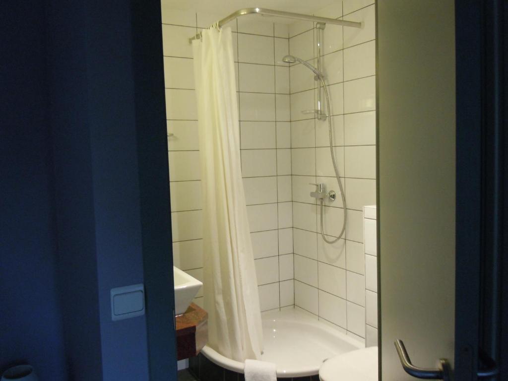 Koupelna v ubytování Hotel Malcot