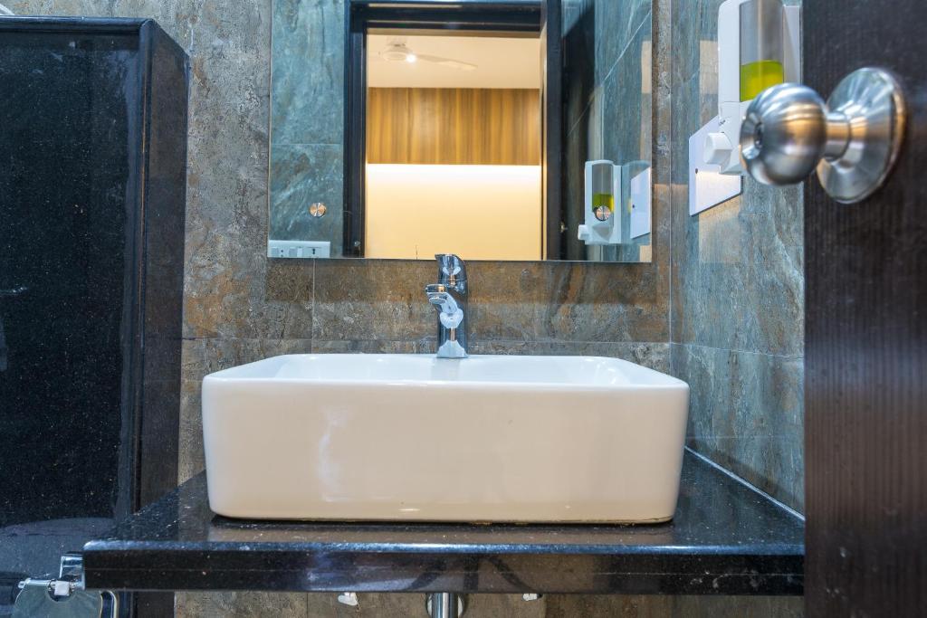 Koupelna v ubytování Rupam Hotel
