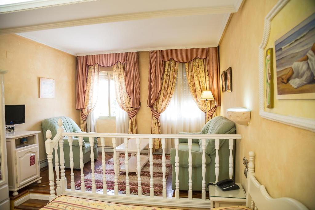 Postel nebo postele na pokoji v ubytování Los Arcos