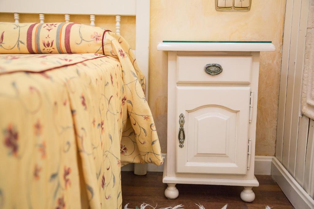 Postel nebo postele na pokoji v ubytování Los Arcos