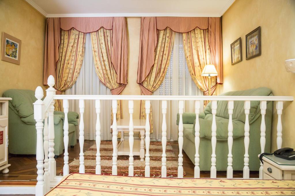 Postel nebo postele na pokoji v ubytování Los Arcos