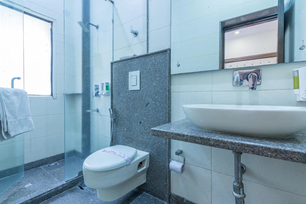 Koupelna v ubytování Rupam Hotel