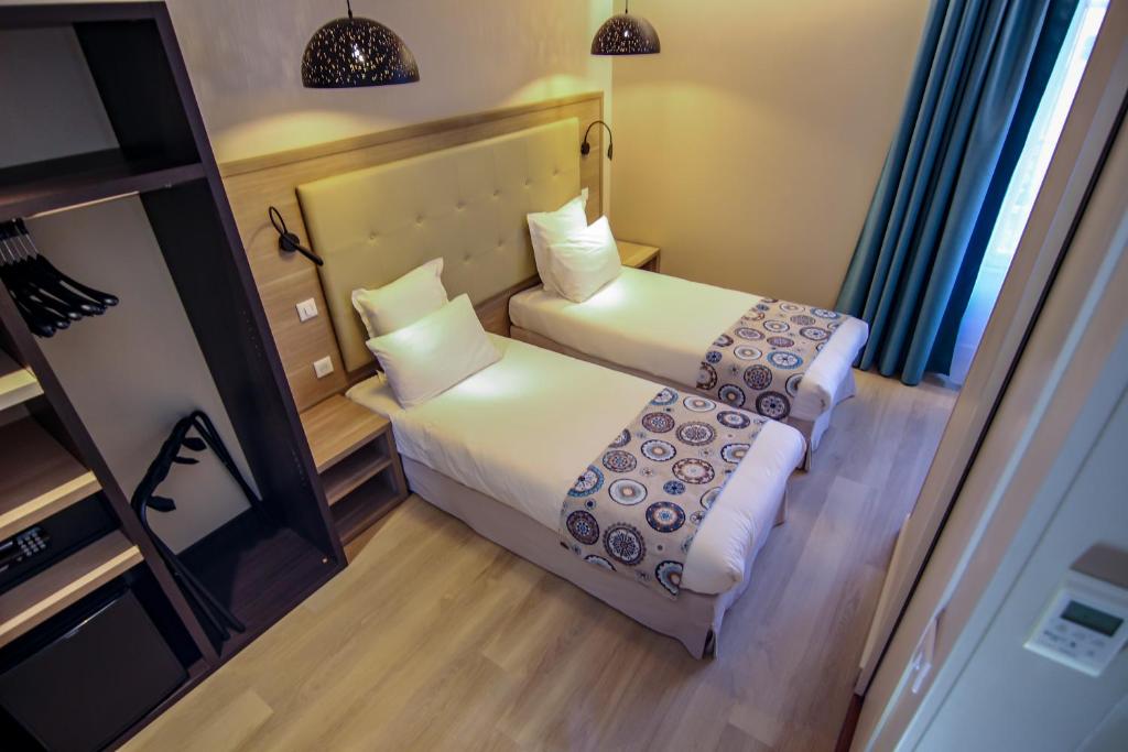 Hôtel Montaigne - 6