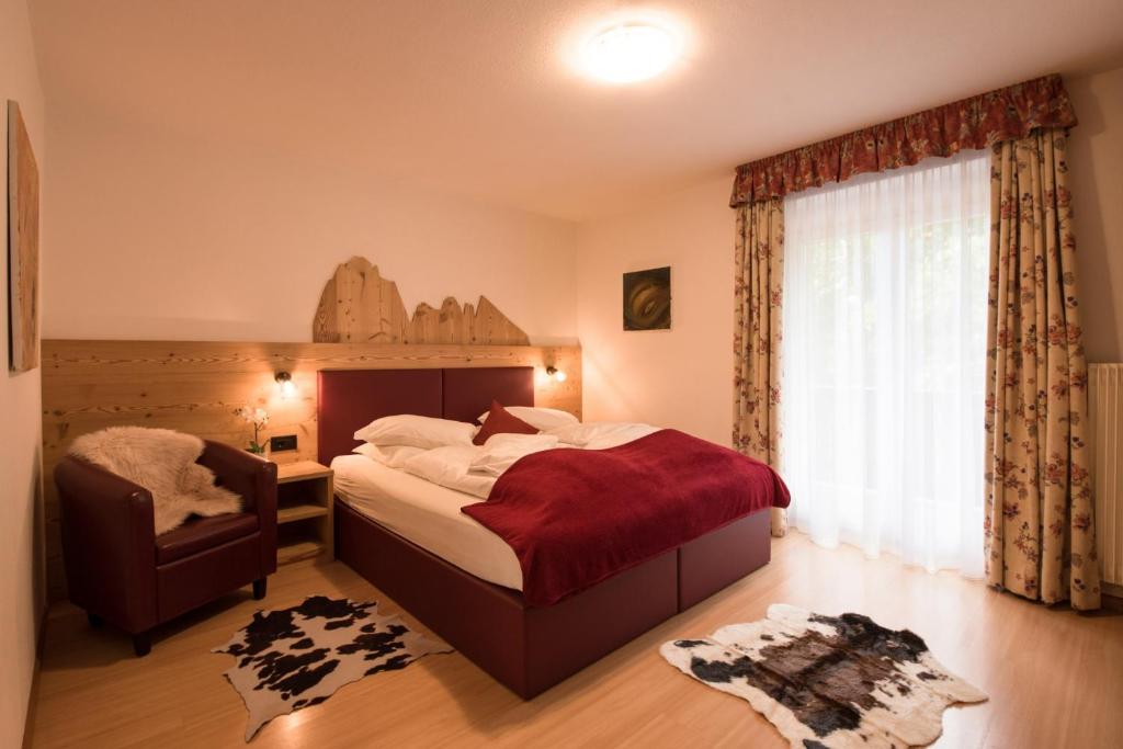 Posteľ alebo postele v izbe v ubytovaní Residence Sisi