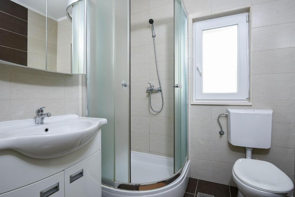Kúpeľňa v ubytovaní Apartments Andrija Orebić