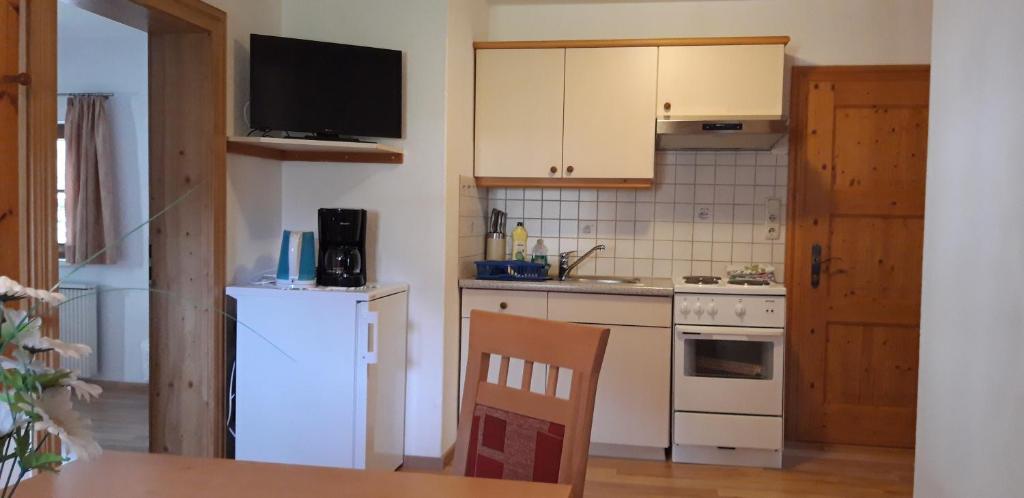 Kuchyň nebo kuchyňský kout v ubytování Haus Moser