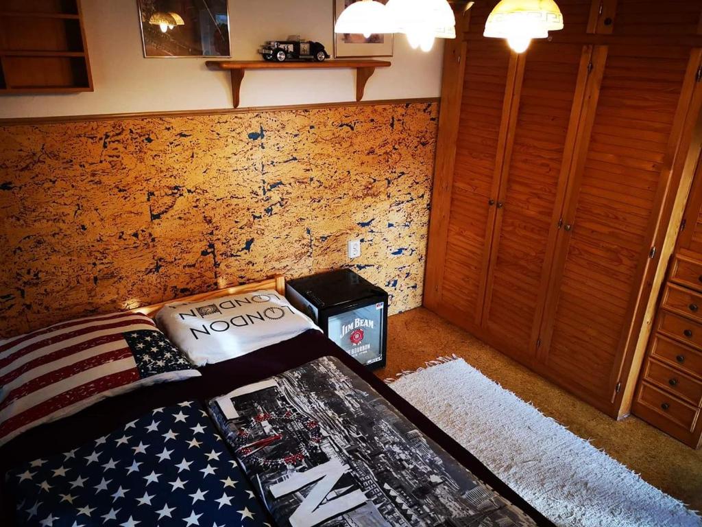 Postel nebo postele na pokoji v ubytování Széplak apartman