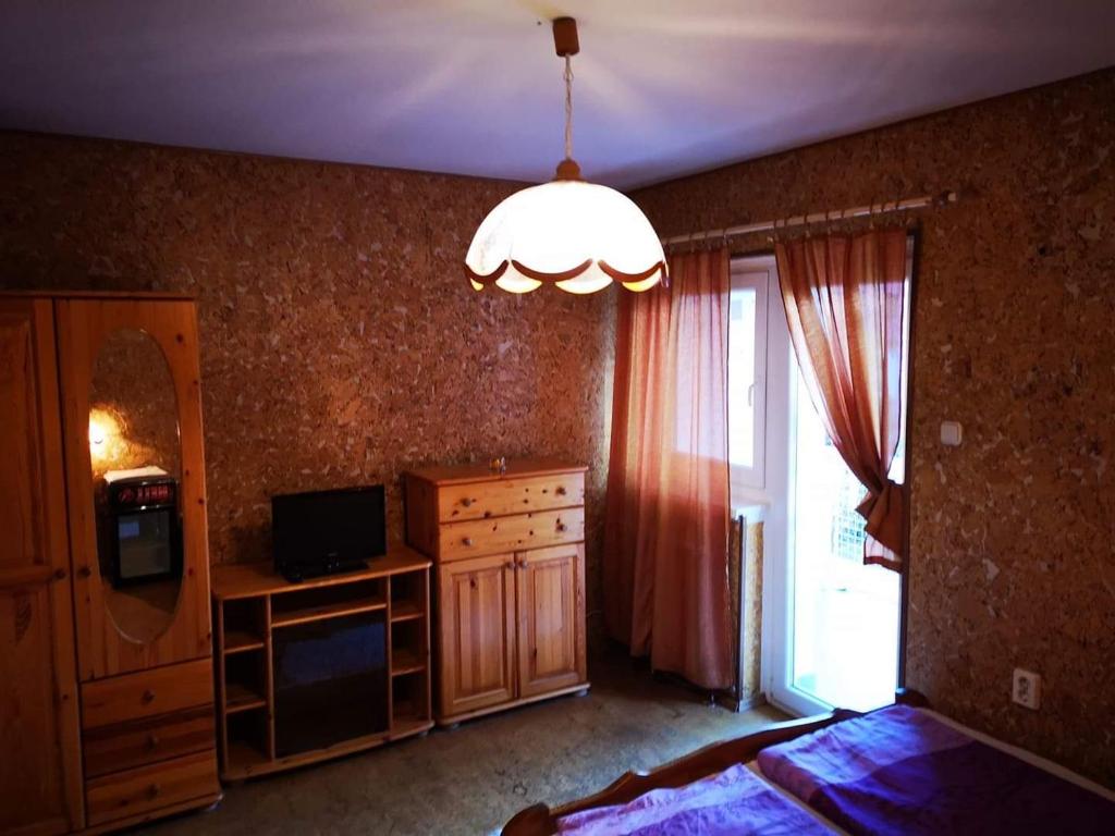 Postel nebo postele na pokoji v ubytování Széplak apartman