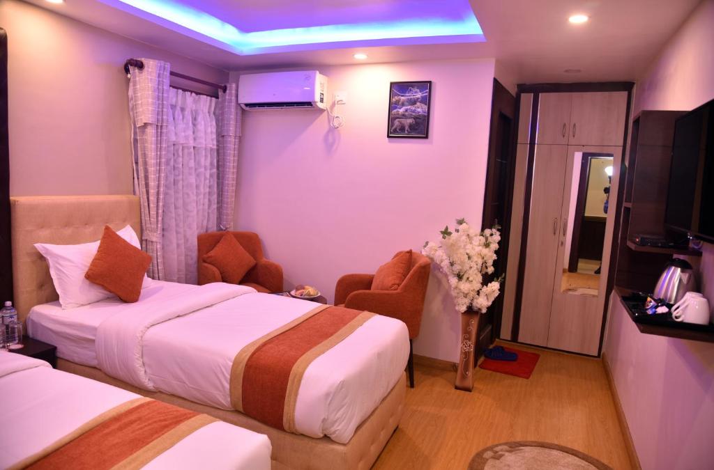Postel nebo postele na pokoji v ubytování Marinha Airport Hotel