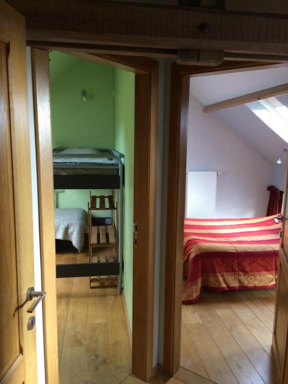 Postel nebo postele na pokoji v ubytování Gîte Saint-Martin de la Fauvette
