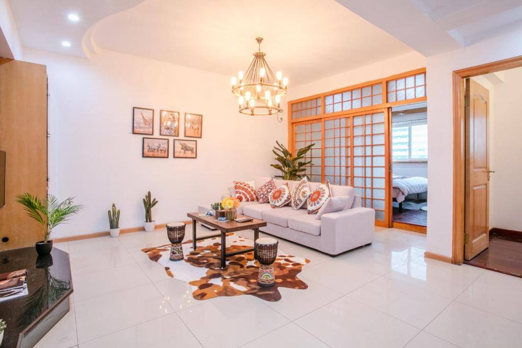 Zona de estar de Jinjiang Chunxi Road Locals Apartment 00127680