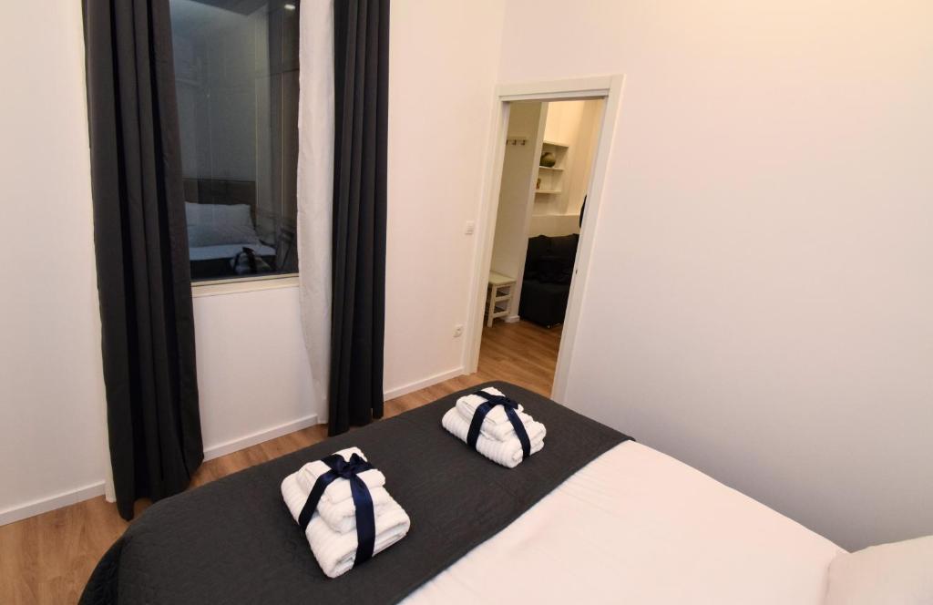 Posteľ alebo postele v izbe v ubytovaní ZAGRABY APARTMENT