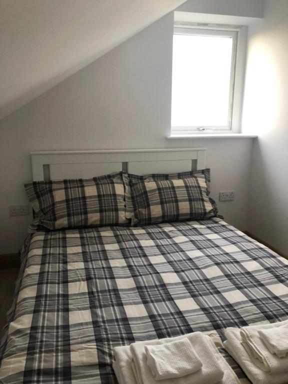 A bed or beds in a room at quiet secluded loft in County Durham