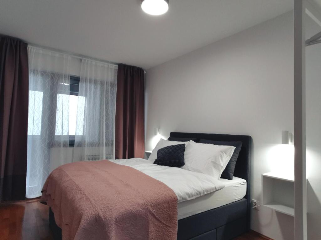 Postel nebo postele na pokoji v ubytování Goreta032 Apartment