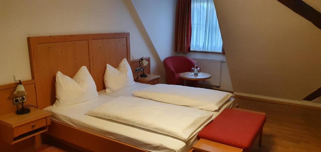 Postel nebo postele na pokoji v ubytování Landgasthof Krone