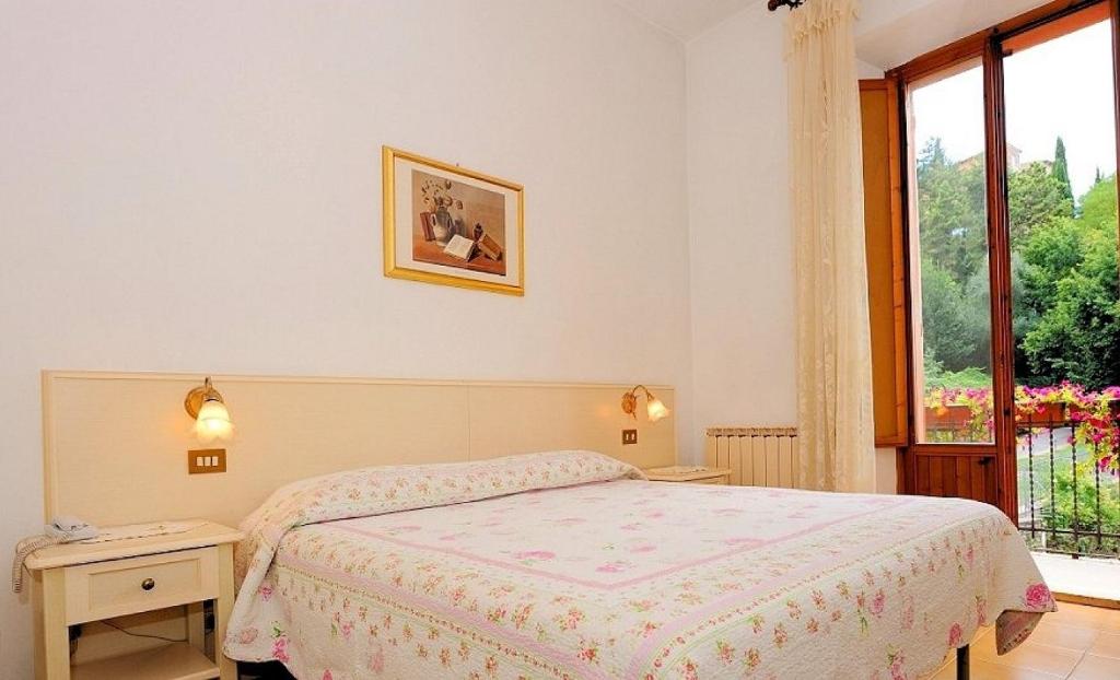 Postel nebo postele na pokoji v ubytování Hotel San Sebastiano