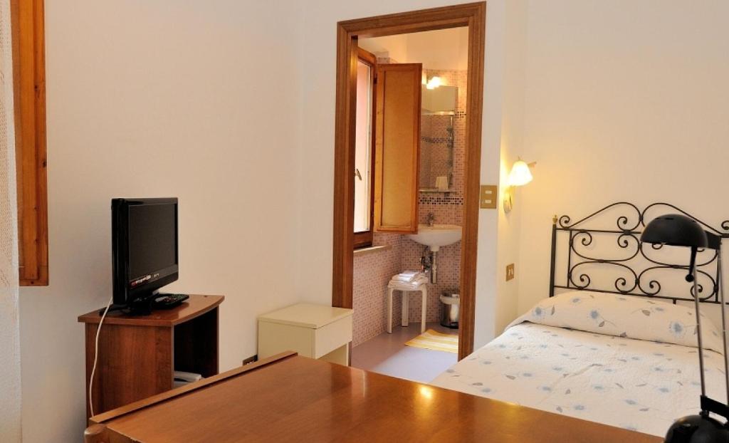 Postel nebo postele na pokoji v ubytování Hotel San Sebastiano