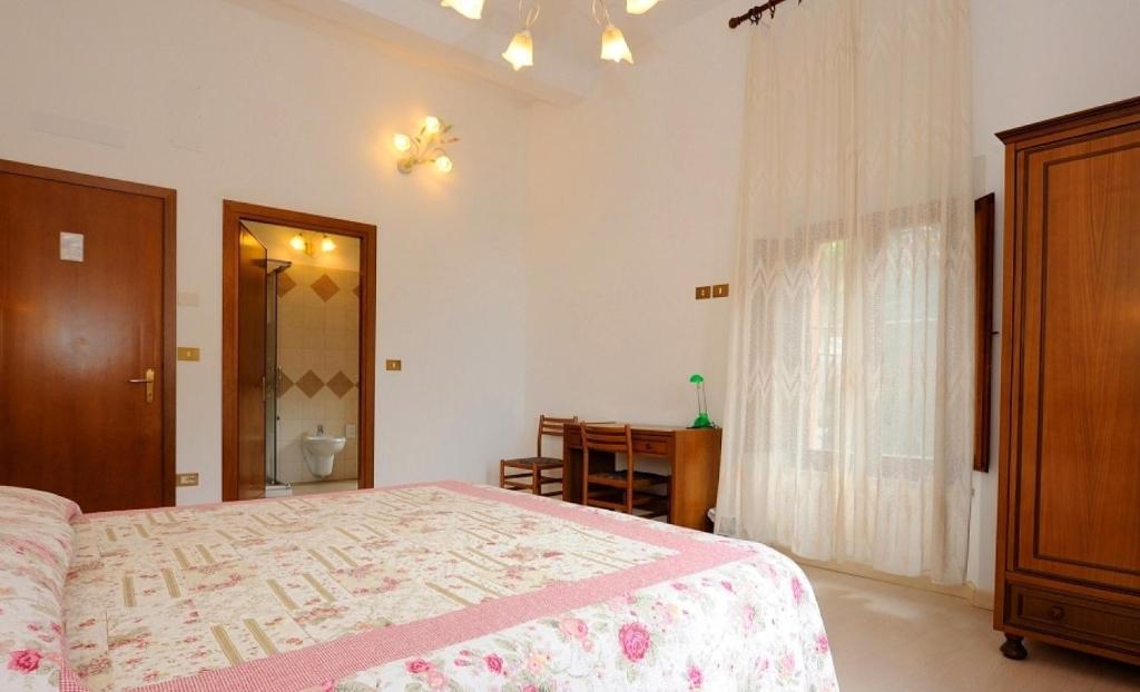 Postel nebo postele na pokoji v ubytování Hotel San Sebastiano