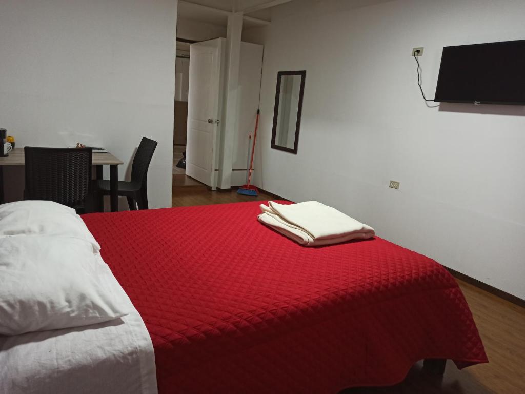 Postel nebo postele na pokoji v ubytování Habitaciones Alkimya
