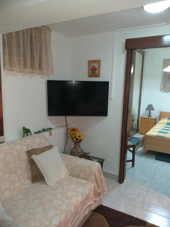 Postel nebo postele na pokoji v ubytování Kanarinis Apartments