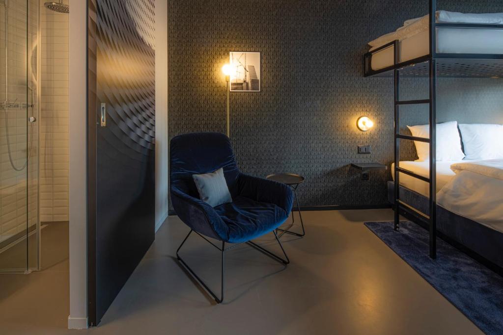 Postel nebo postele na pokoji v ubytování BLOOM Boutique Hotel & Lounge Basel