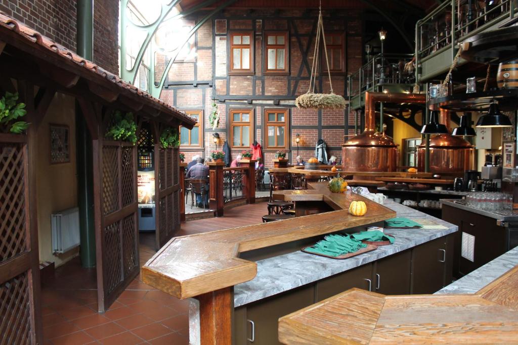 Ein Restaurant oder anderes Speiselokal in der Unterkunft Hotel zum Brauhaus 