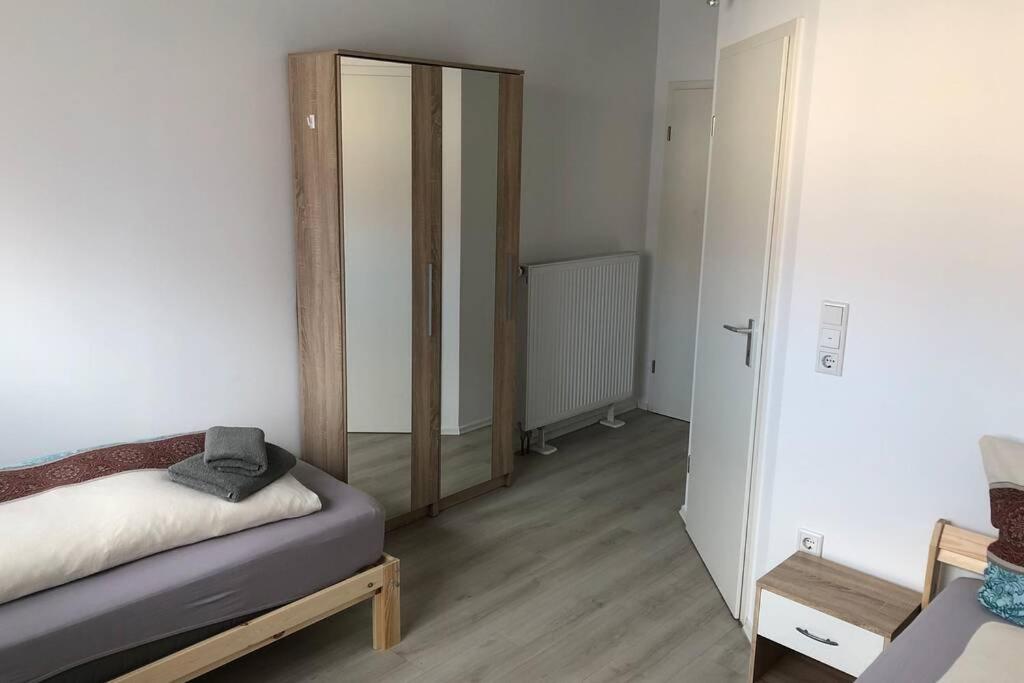 Postel nebo postele na pokoji v ubytování Zimmer 3