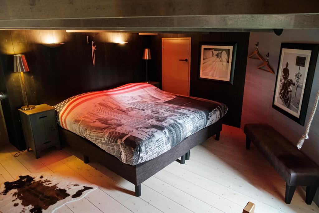 Postel nebo postele na pokoji v ubytování Bed&Bbq Longhornranch