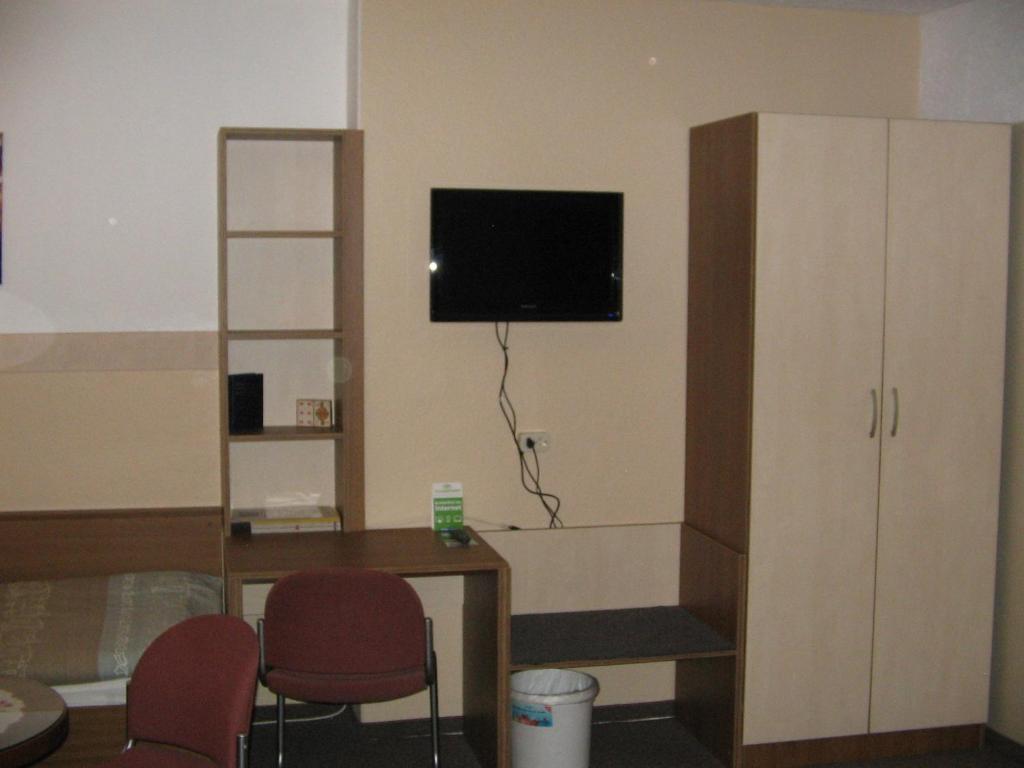 TV a/nebo společenská místnost v ubytování Pension "City"