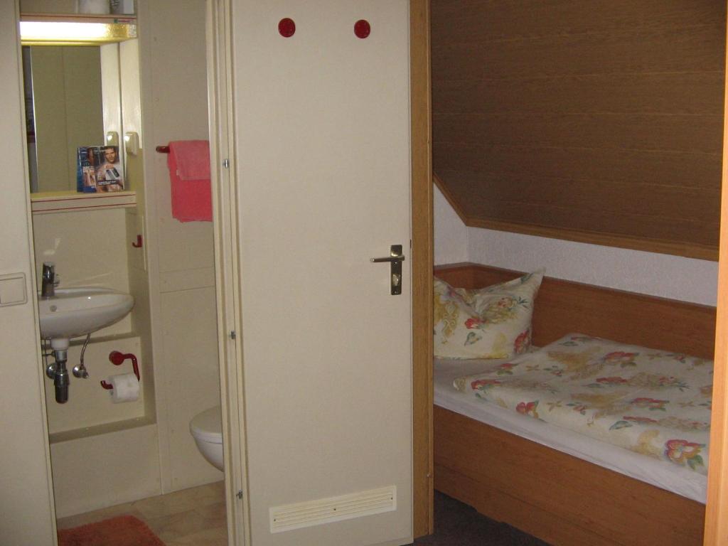Postel nebo postele na pokoji v ubytování Pension "City"
