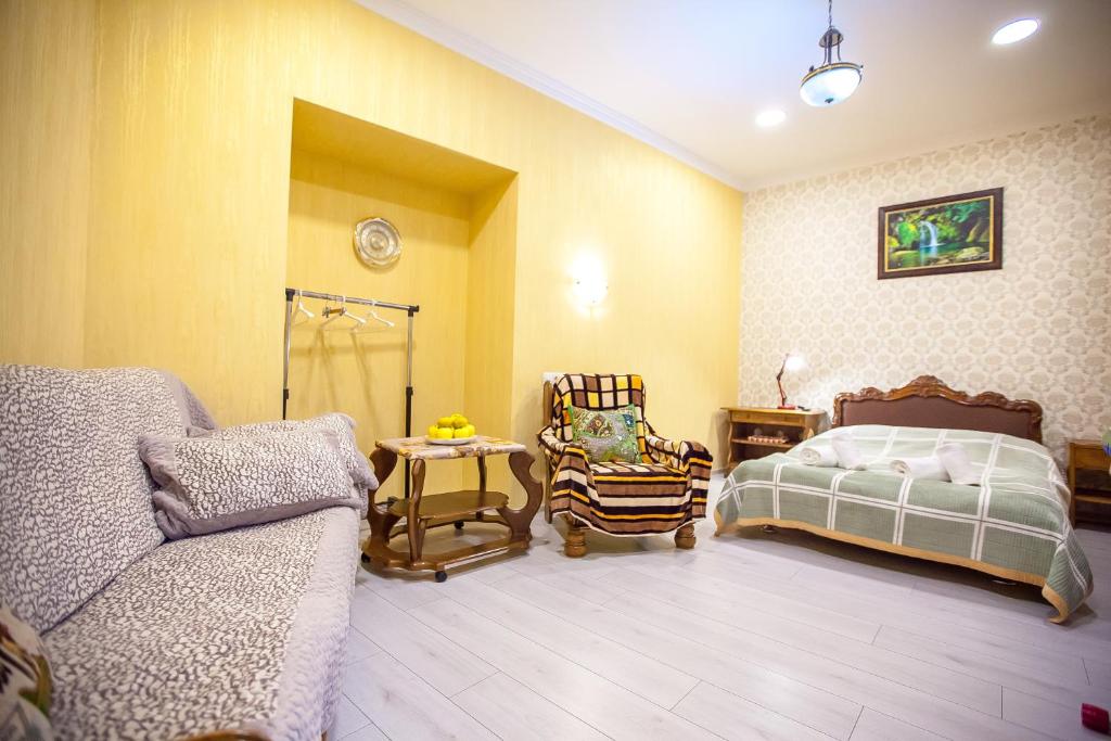 Postel nebo postele na pokoji v ubytování Guest House Happy Holidays