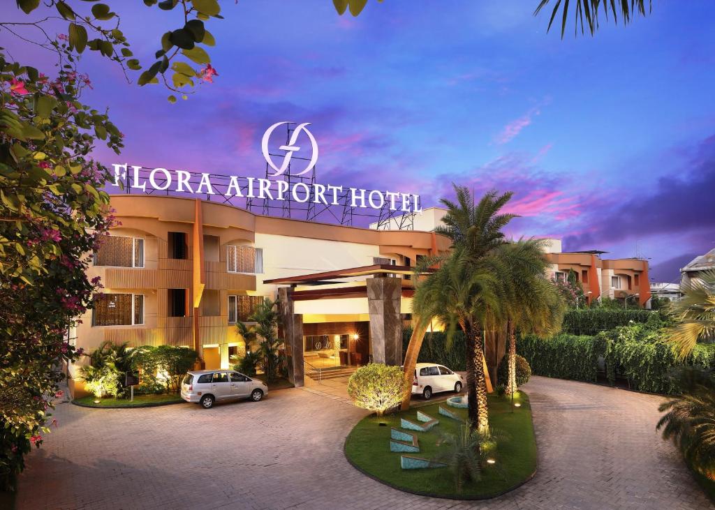 a hotel with a sign that reads honda airrider hotel at Flora Airport Hotel and Convention Centre Kochi in Nedumbassery