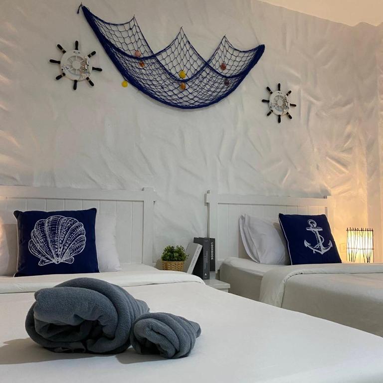 Posteľ alebo postele v izbe v ubytovaní Phi Phi Indigo Hotel