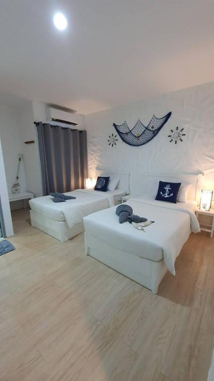 Posteľ alebo postele v izbe v ubytovaní Phi Phi Indigo Hotel