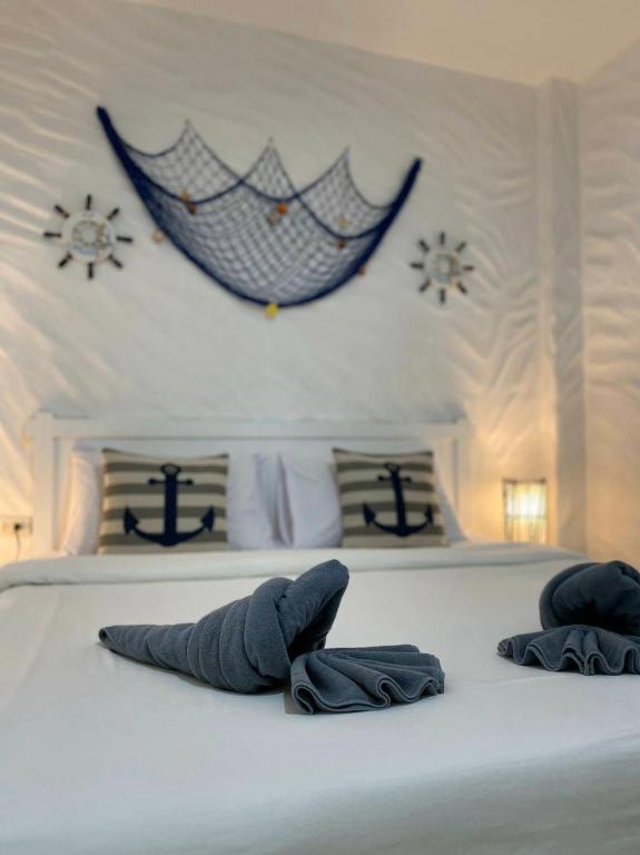 Posteľ alebo postele v izbe v ubytovaní Phi Phi Indigo Hotel