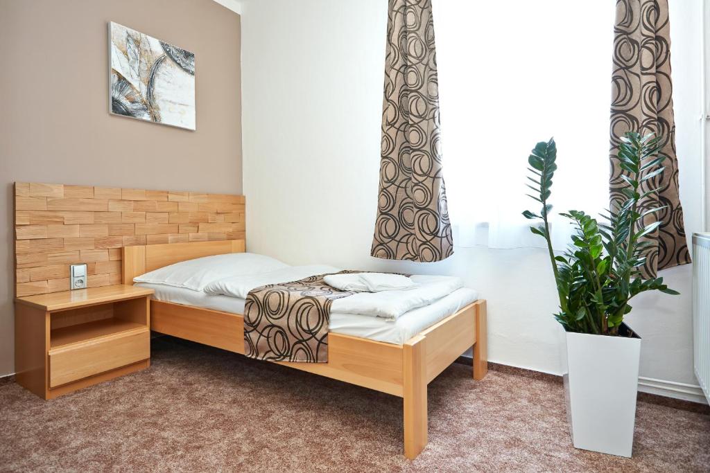 Postel nebo postele na pokoji v ubytování Vila Encore