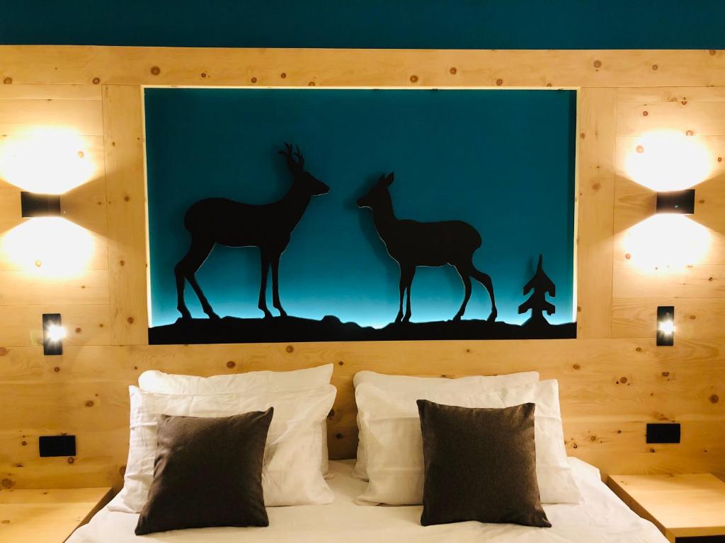 Postel nebo postele na pokoji v ubytování Fulun Mountain Lodge