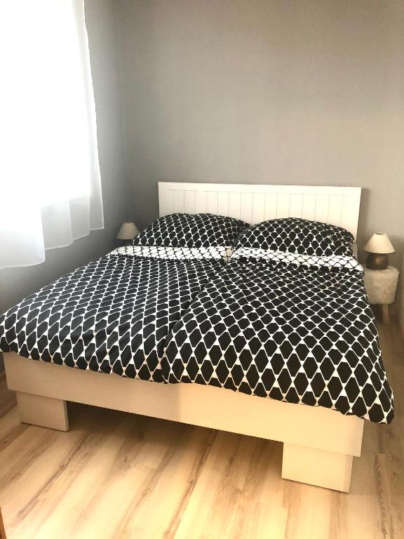 Postel nebo postele na pokoji v ubytování Apartment Tatry - spacious 3BD, Netflix & fast internet