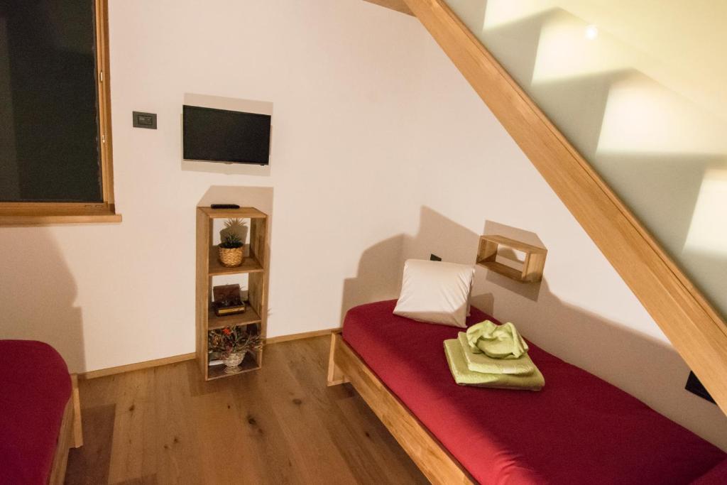 Televízia a/alebo spoločenská miestnosť v ubytovaní b&bTerre Aromatiche