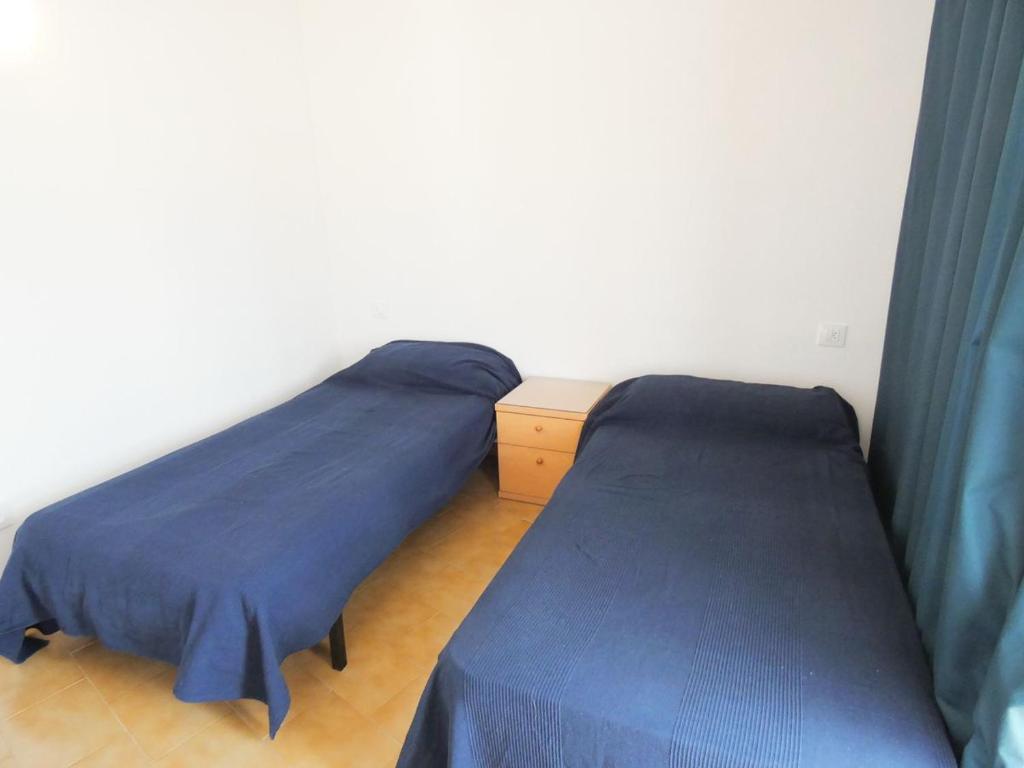 Postel nebo postele na pokoji v ubytování Bora 4-C
