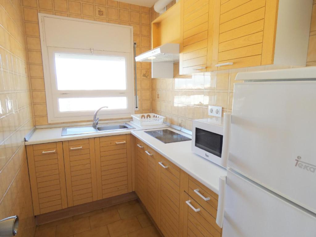Kuchyň nebo kuchyňský kout v ubytování Bora 4-D