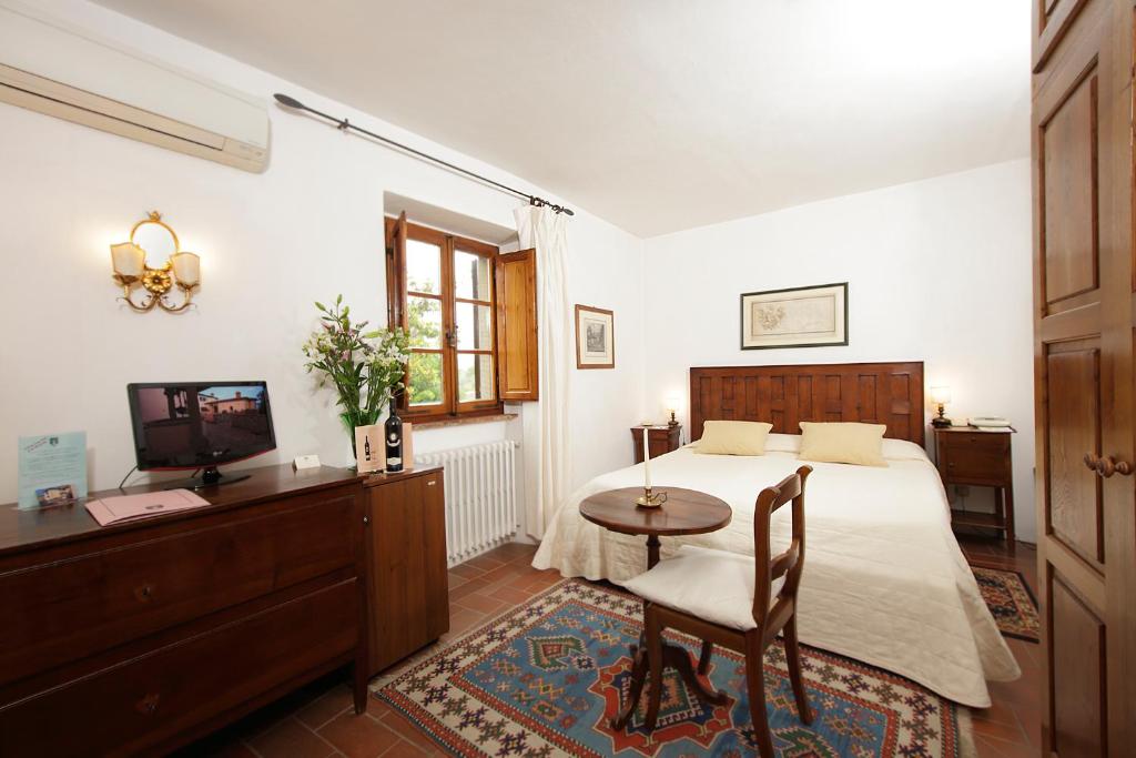 Posteľ alebo postele v izbe v ubytovaní Relais Vignale & Spa