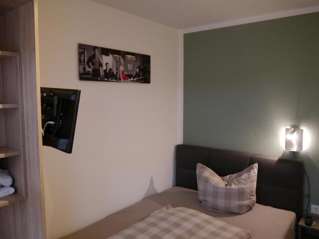 Postel nebo postele na pokoji v ubytování Hotel Haus Wittwer