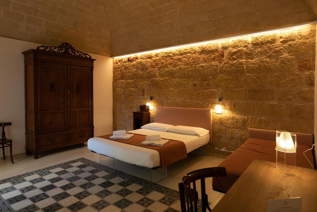 Postel nebo postele na pokoji v ubytování Ricordi Siciliani - Charme B&B
