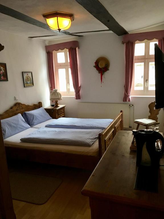 Postel nebo postele na pokoji v ubytování Hostaria del Castello