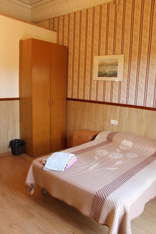 Postel nebo postele na pokoji v ubytování Pensión Villanueva