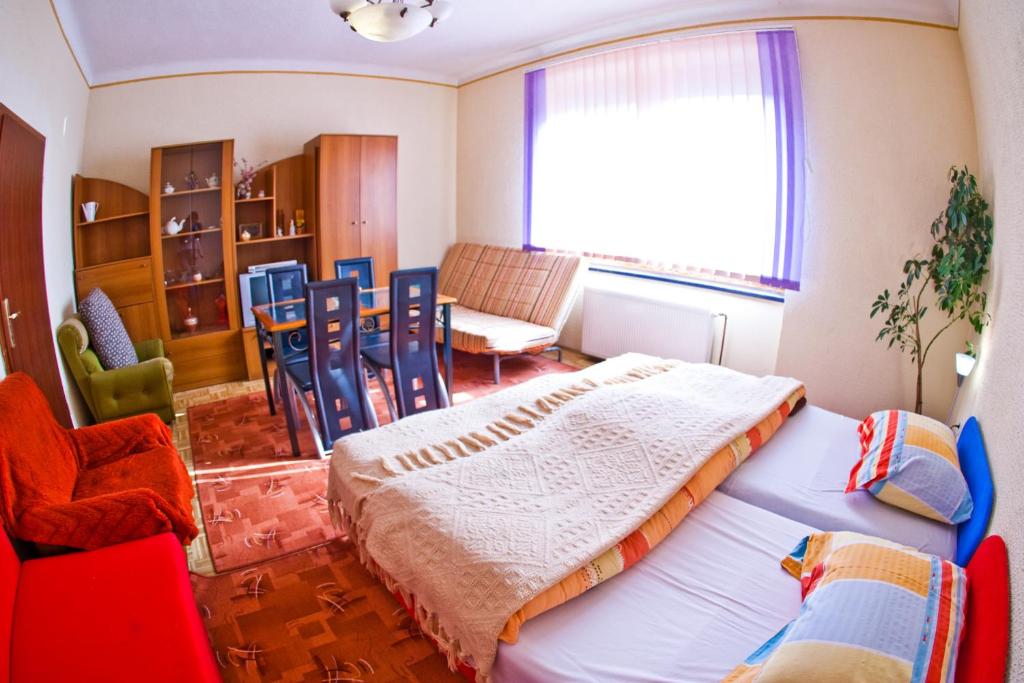 Posezení v ubytování Guest House Pikapolonca