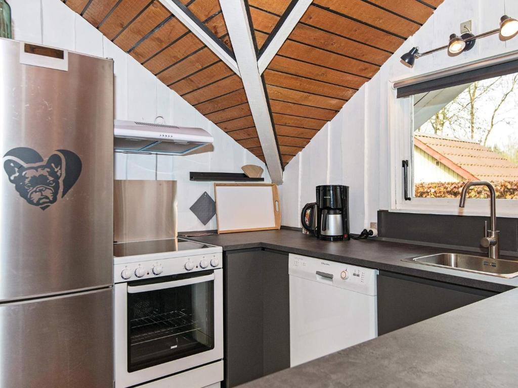 Kuchyň nebo kuchyňský kout v ubytování Holiday home Ansager XII